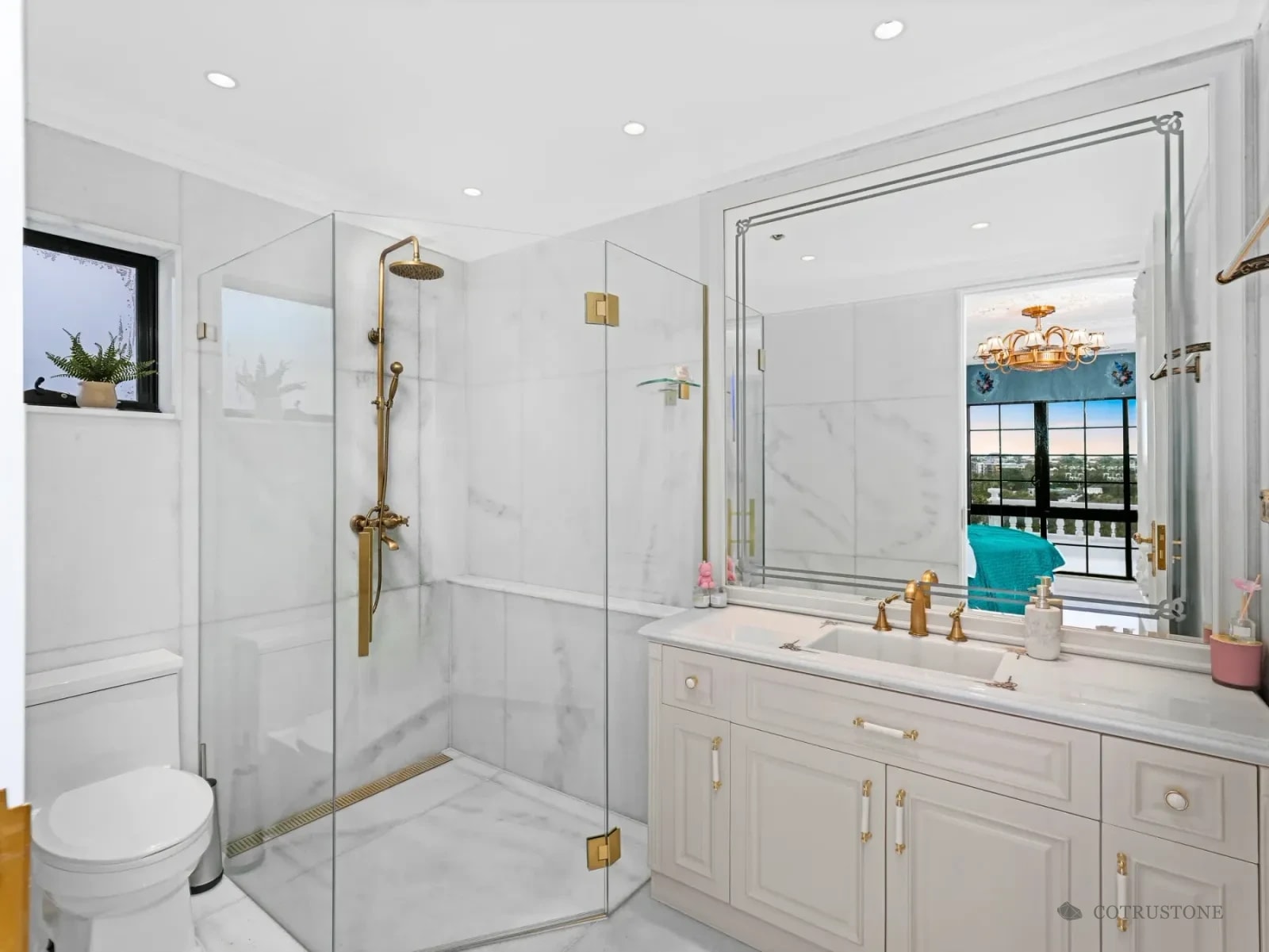 Installed marble wall panels, shower surround and vanity top in an Australian residential bathroom