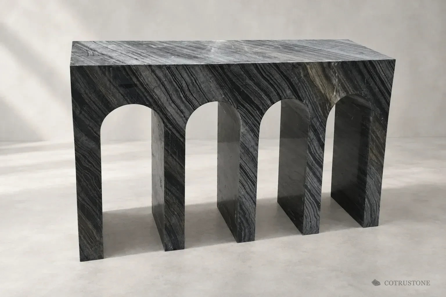 Three-arch dark veined stone console on a neutral studio background