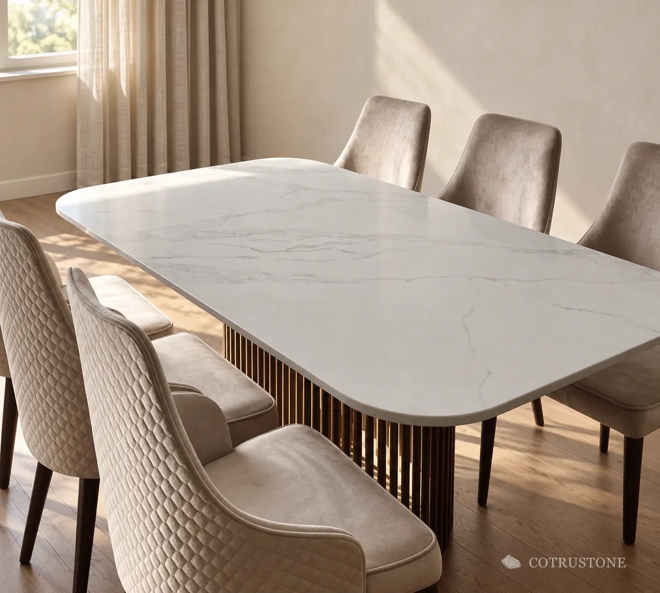 Light rectangular dining table with rounded corners, vertical slatted supports and upholstered chairs beside a window