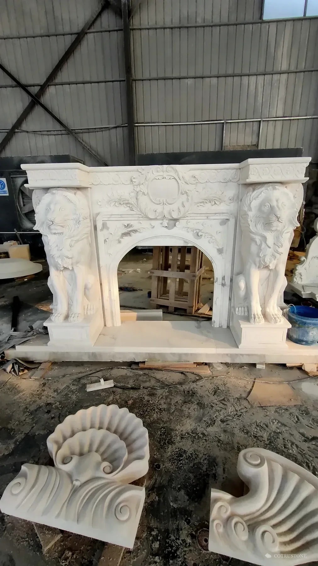 Original workshop photograph · carved fireplace