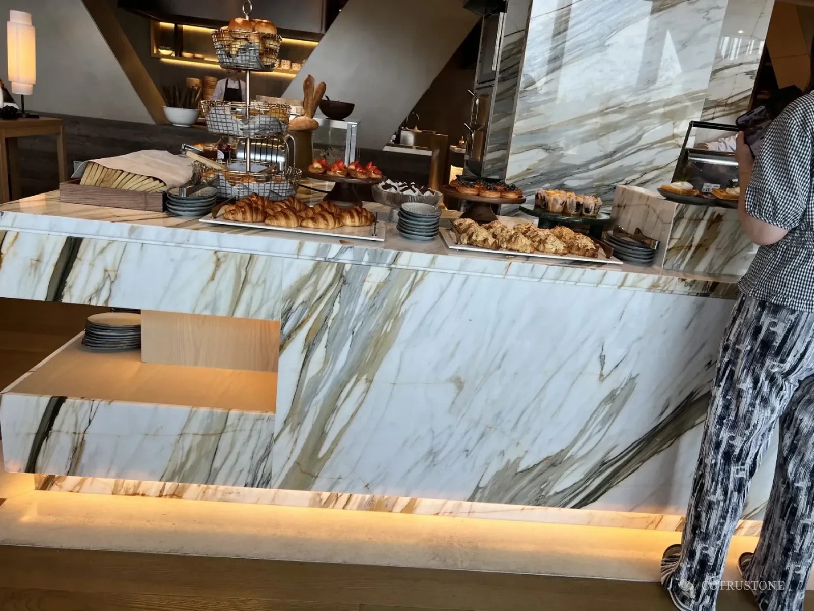 Original photograph of a marble buffet counter and adjoining stone column in use