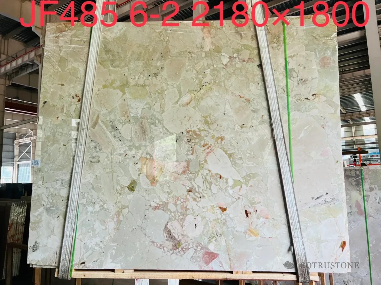 Monet Garden natural marble slab with pale green cream and rose mineral movement