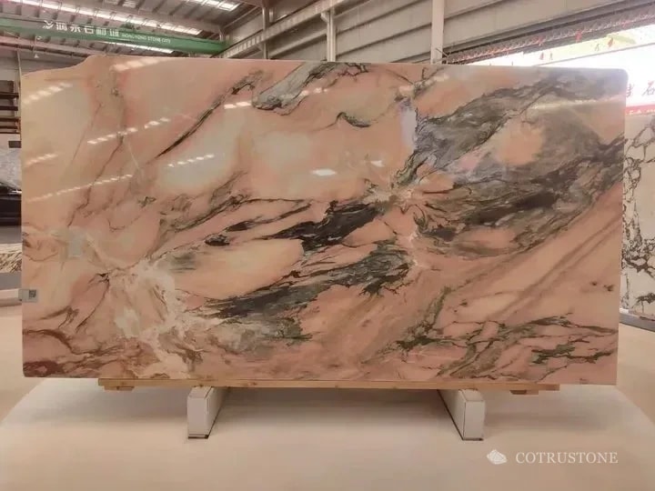 Rosso Antique marble slab with warm pink and grey veining