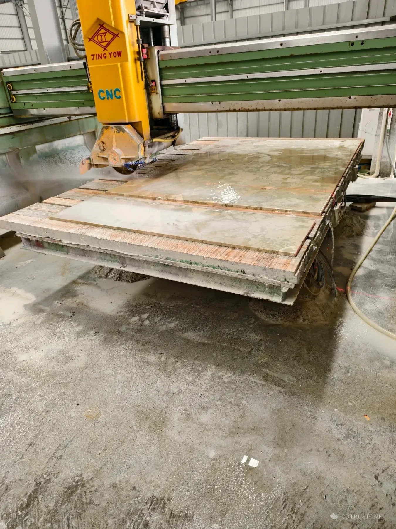 Stone component being machined for the Monet Garden vanity order