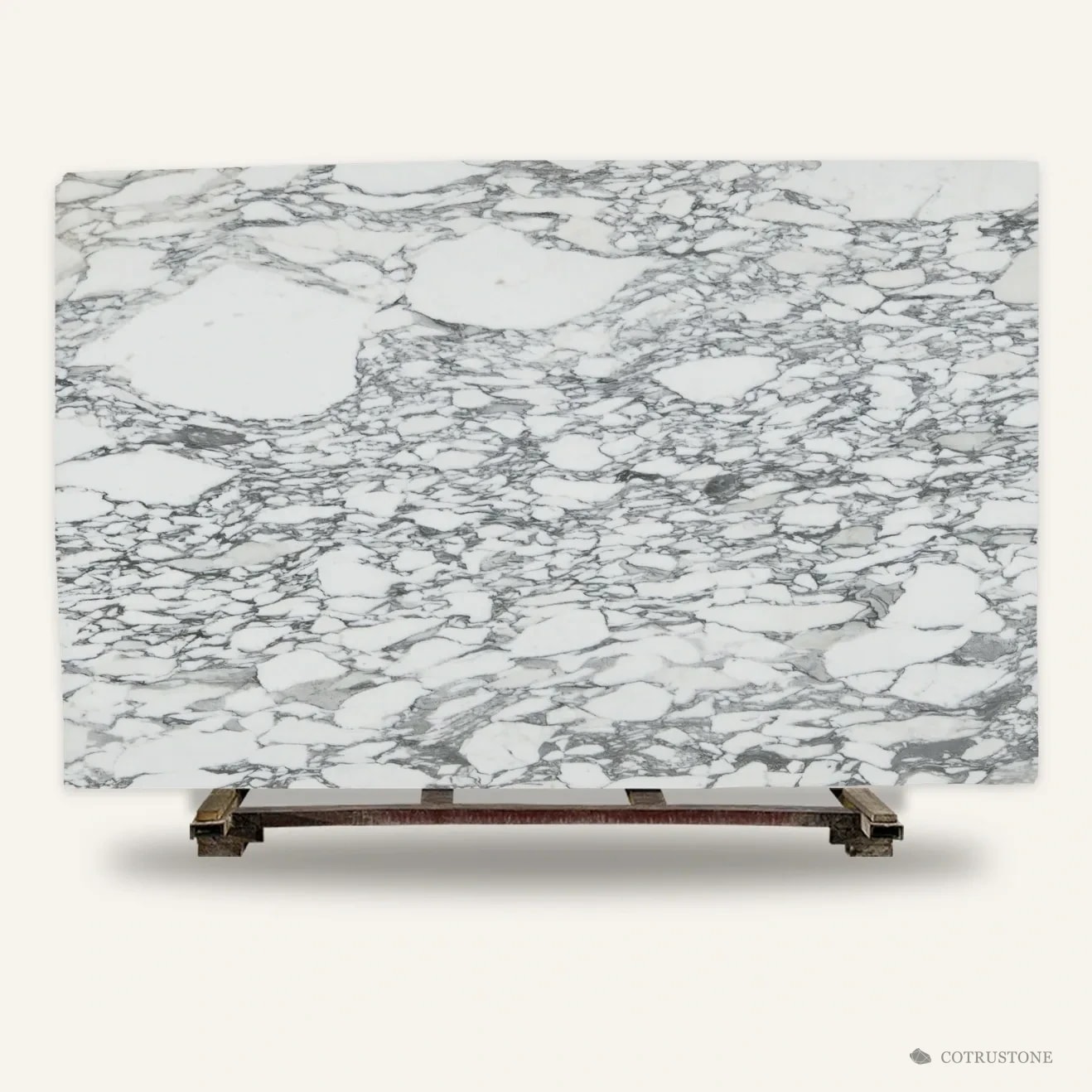 A whole slab of Arabescato Vagli Marble standing on a timber pallet