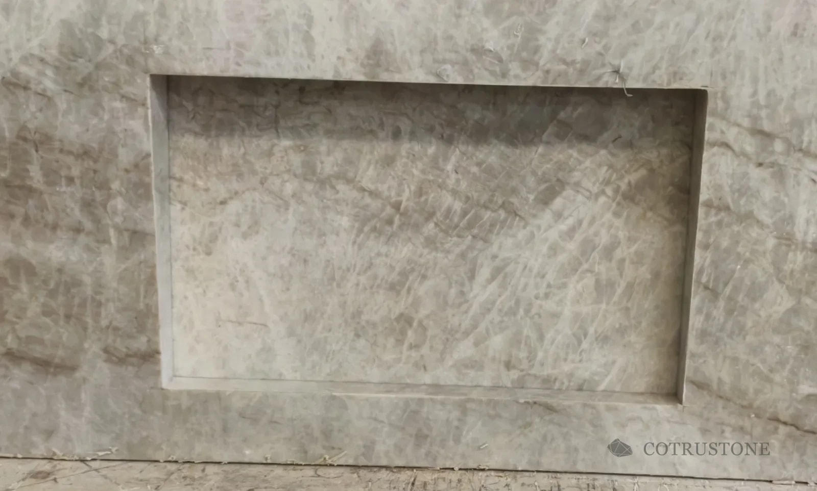 Taj Mahal stone grain around a fabricated recessed bowl and edge