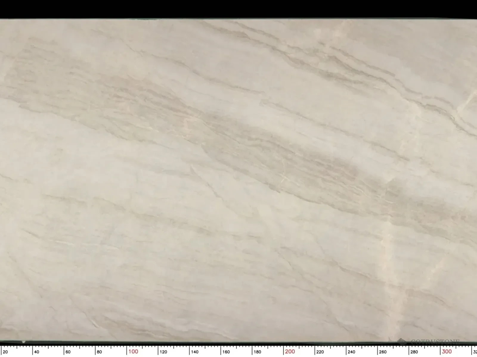 Full Taj Mahal quartzite slab with diagonal warm beige movement