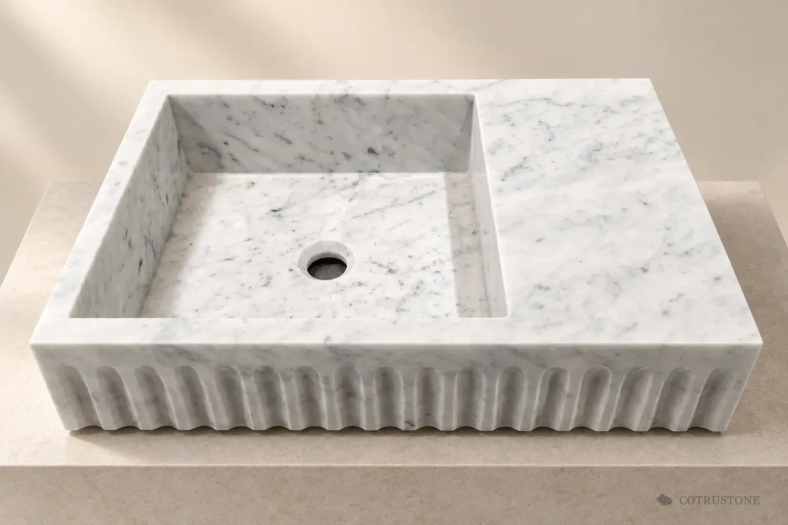 Fluted basin with integral side deck