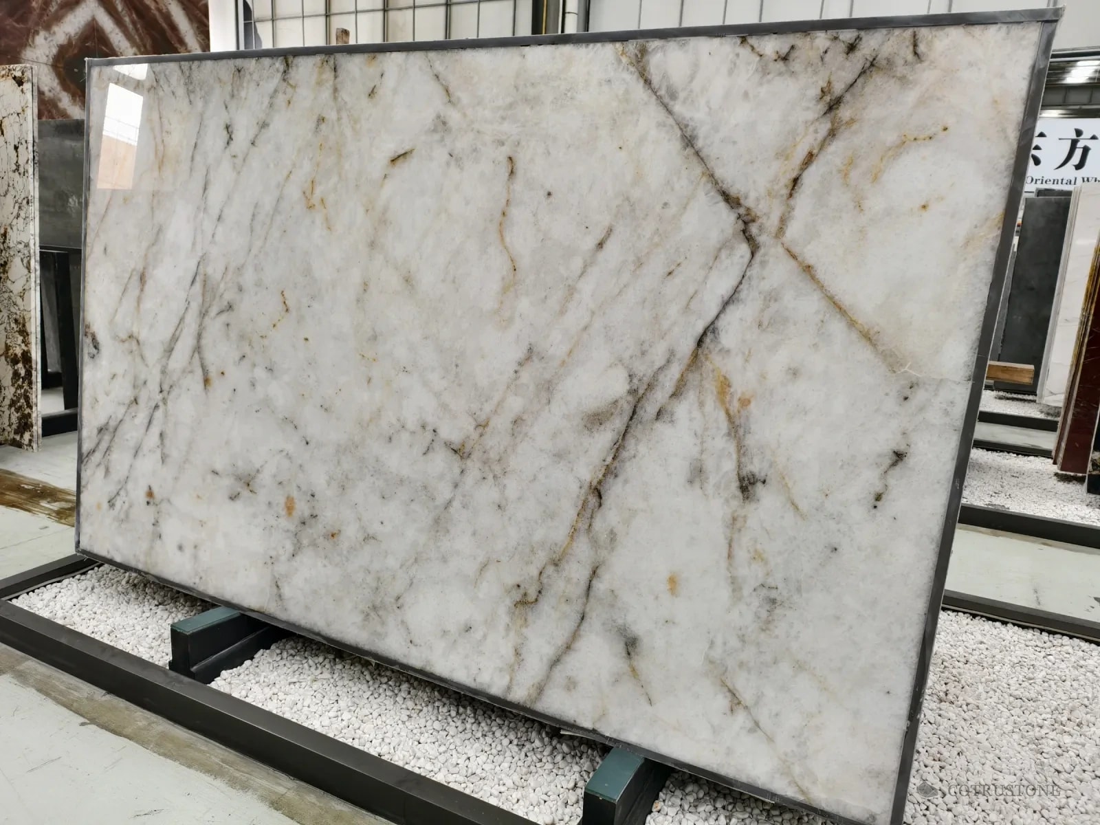 A full slab of Cristallo quartzite with golden veins